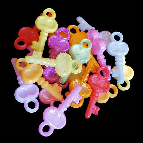 Tiny charms in the shape of little keys measuring 7/8