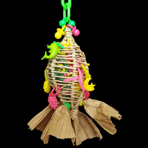 Stuffed full of crinkle cut paper with little charms, this vine "torpedo" is a perfect foraging toy for small birds! Hide special treats inside to keep your bird busy. The paper bows will provide additional shredding fun. This toy has no metal parts.