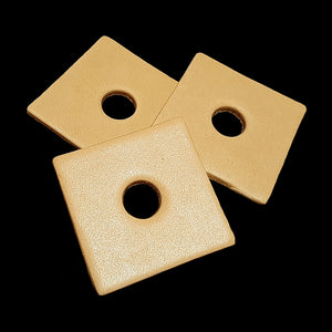 Bird-safe vegetable tanned leather squares measuring 1-1/2" by 1-1/2" with a 3/8" center hole.