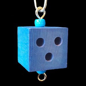A 1-1/4" hardwood cube with three 1/4" holes. Includes cool clip link for hanging and eye screws on the top & bottom. Recommended for making small to medium toys.