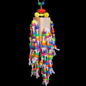 Over 300 pony beads knotted on cotton rope strands! The base is a 4" block topped with a snowflake ring and beads. Our experience has shown bead toys help feather pickers and are a great starter for birds that don't know how to play with toys.  Hangs appr