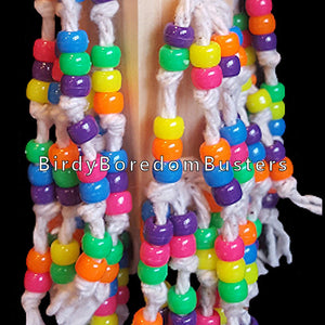 Over 300 pony beads knotted on cotton rope strands! The base is a 4" block topped with a snowflake ring & beads. Our experience has shown bead toys help feather pickers and are a great starter for birds that don't know how to play with toys.
