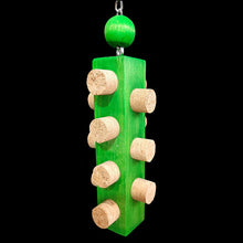 Load image into Gallery viewer, Easy to chew cork stoppers inserted into all sides of a brightly colored 1-1/4&quot; by 6&quot; pine block base topped off with a hardwood ball. Hangs from nickel plated hardware.  Measures approx 2-1/2&quot; by 9&quot; including link.
