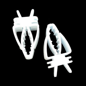 Plastic treat clips for holding cuttlebone, spray millet, fruit and veggie slices and treats for small birds. Easy to take on and off for cleaning.